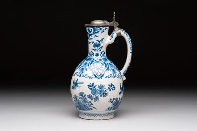 A blue and white Dutch Delft jug with pewter cover, 1st quarter 18th C.