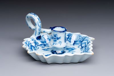 A blue and white Dutch Delft leaf-shaped chamberstick, 18th C.