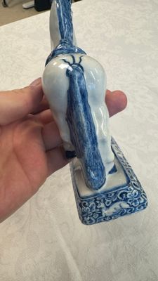 A blue and white Dutch Delft model of a standing horse — photo 21