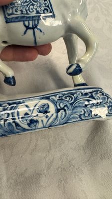 A blue and white Dutch Delft model of a standing horse — photo 6