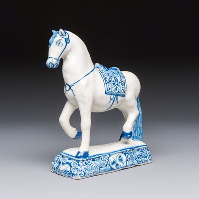 A blue and white Dutch Delft model of a standing horse, 18th C.