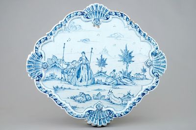 A blue and white Dutch Delft plaque with a romantic scene, 18th C.