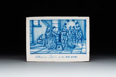 A blue and white Dutch Delft 'Salomé with the Head of St. John the Baptist' plaque, signed J.J. v. Luyn, Utrecht, 19th C.