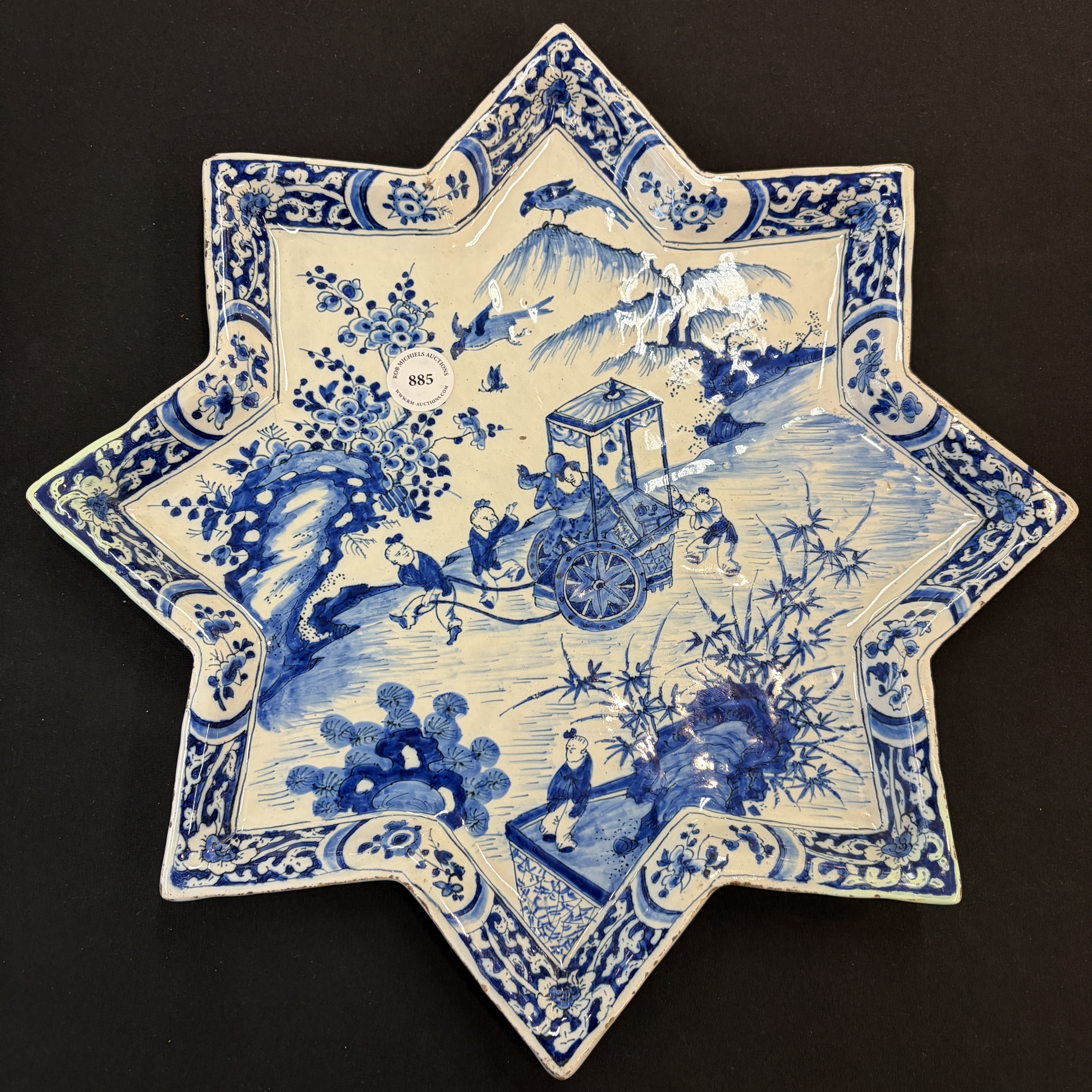 A blue and white Dutch Delft chinoiserie star-shaped dish — photo 1