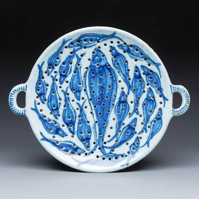 A large blue and white Dutch Delft fish strainer, 18th C.