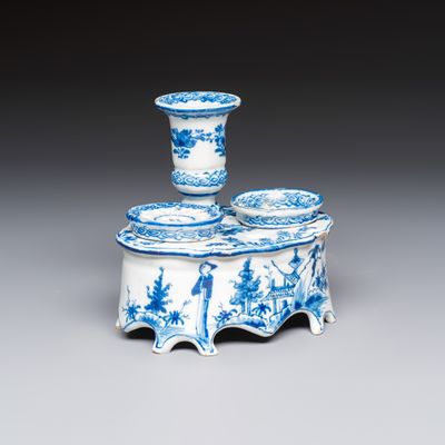 A blue and white Dutch Delft writing set with candlestick, 18th C.