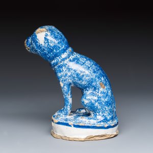 A blue splashed model of a seated dog — photo 4