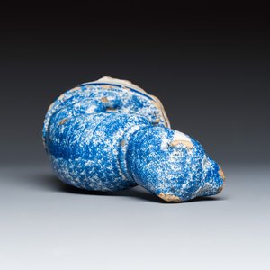 A blue splashed model of a seated dog — photo 6