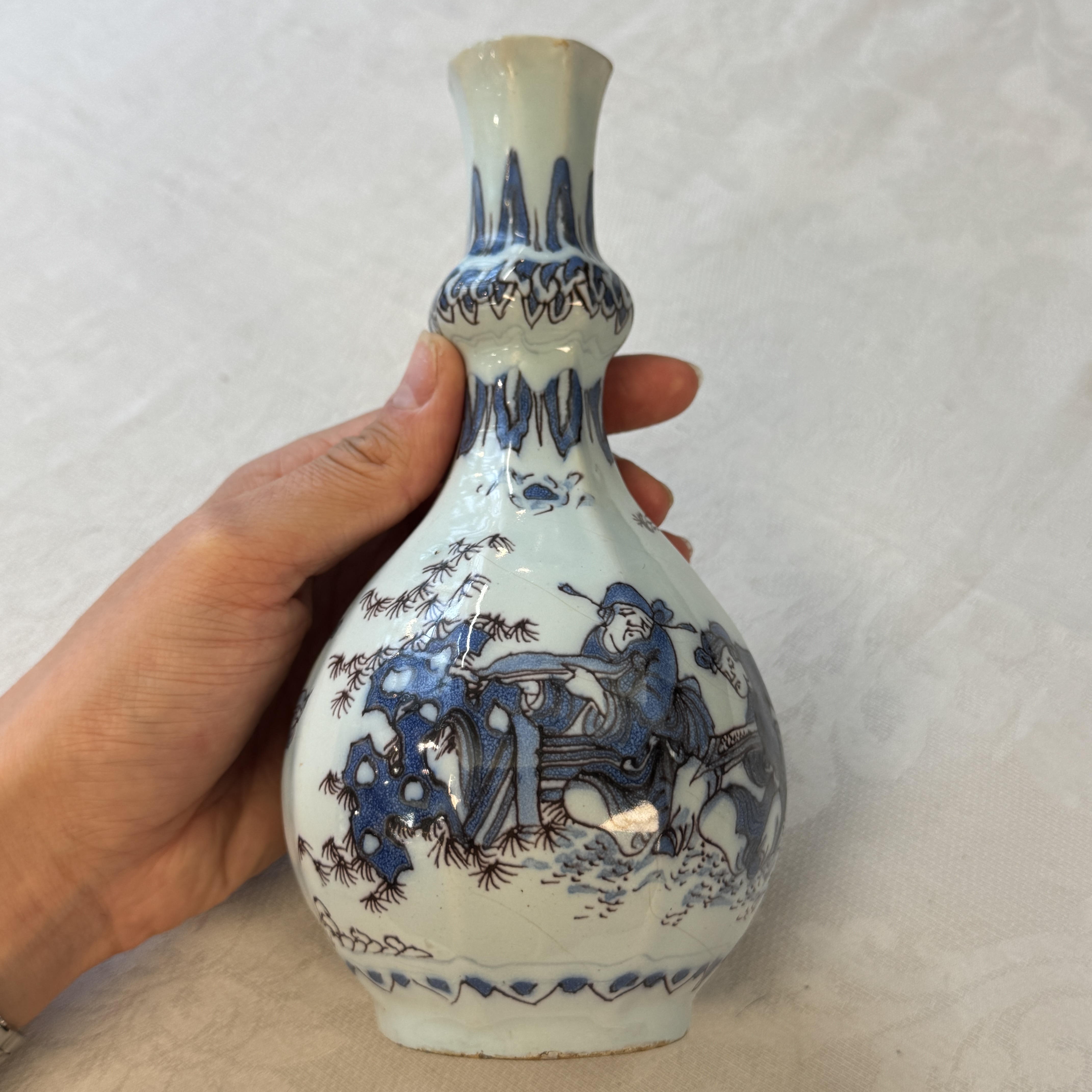 A blue, white and manganese Dutch Delft chinoiserie bottle vase — photo 1