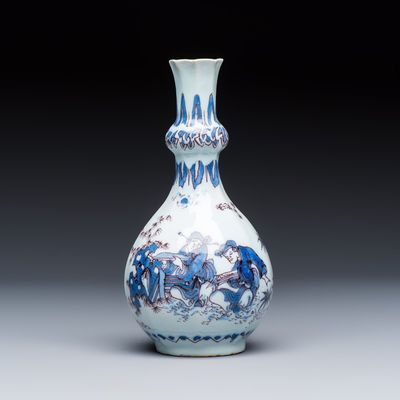 A blue, white and manganese Dutch Delft chinoiserie bottle vase, 17th C.