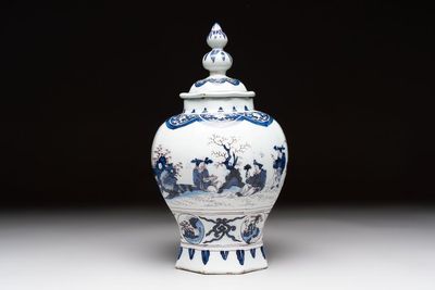 A blue, white and manganese Dutch Delft chinoiserie vase and cover, ca. 1700