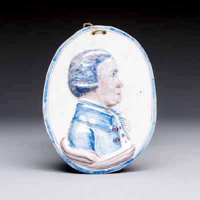 A blue, white and manganese Dutch or English Delftware portrait medallion, 18/19th C.
