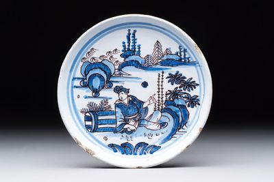 A blue, white and manganese Nevers Transitional style chinoiserie dish, France, 17th C.