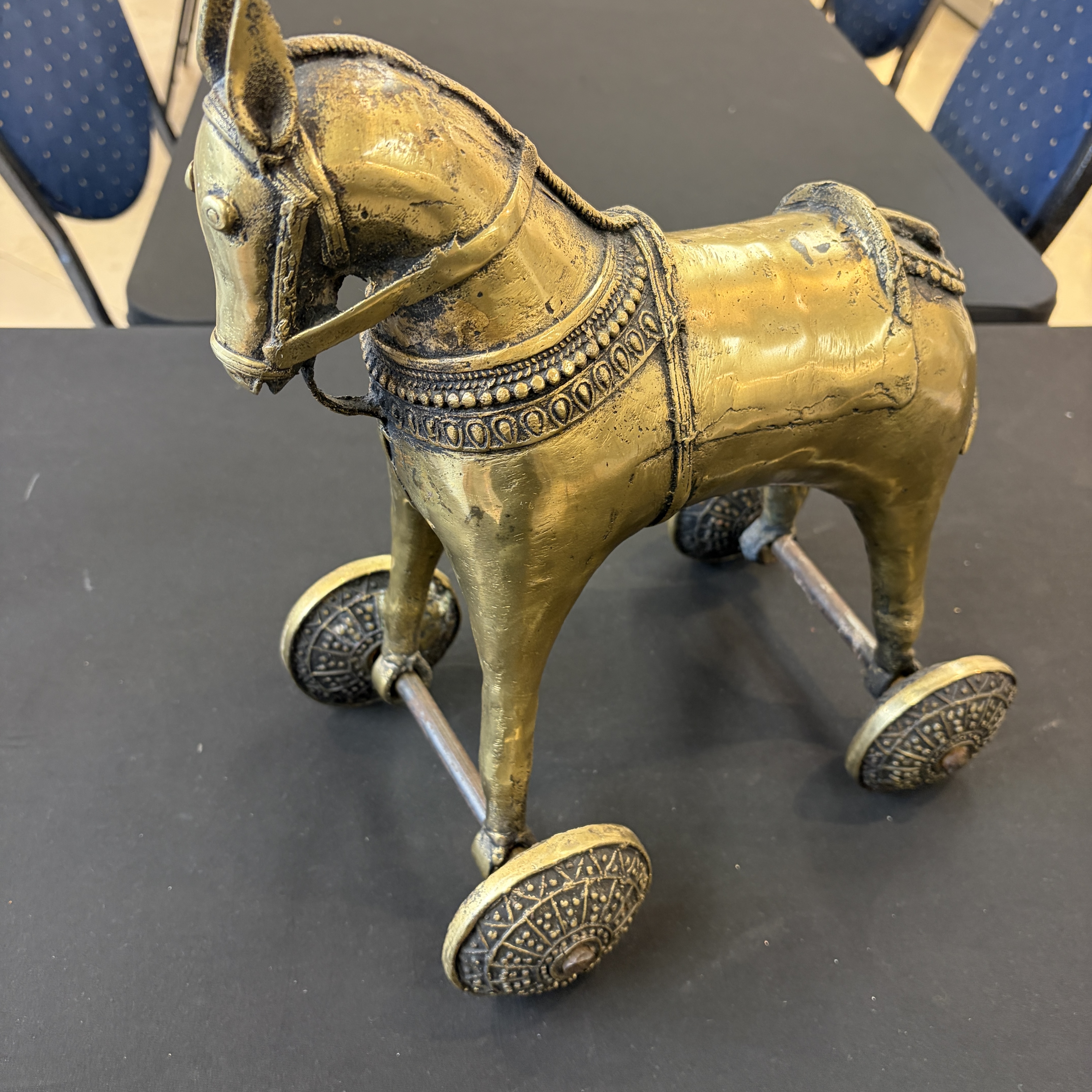 A brass horse on wheels — photo 1