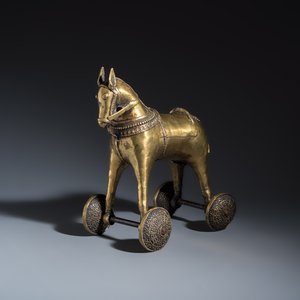 A brass horse on wheels — photo 1