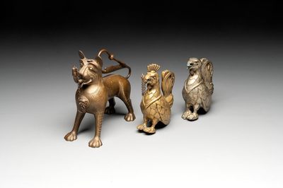 A bronze lion-form aquamanile and two rooster-form aquamanilia, one chromed, Germany, 19th C.