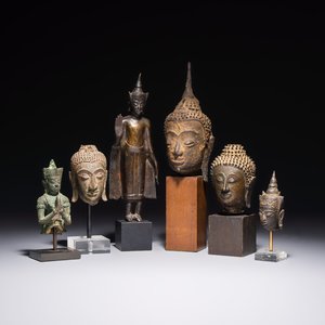 A bronze standing Buddha, a torso of Buddha and four heads of Buddha, Thailand, 17/18th C. — photo 1