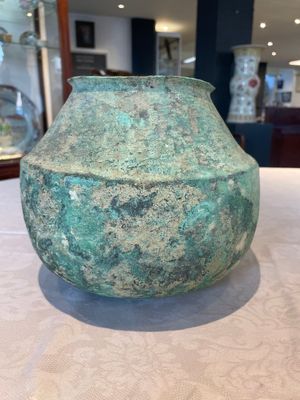 A bronze urn, a bronze canteen with relief design and a pair of bronze oil lamps, Etruscan and Roman civilizations, 9th C. B.C/5th C. — photo 22