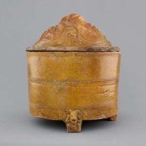 A brown-glazed pottery tripod vessel and mountain cover, Han Dynasty (206 BC-220 AC) — photo 1