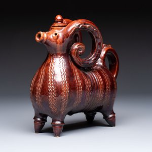 A brown-glazed stoneware ewer and cover in the shape of a ram, impressed mark, Opishne, Ukraine, early 20th C. — photo 1