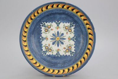 A Brussels faience blue ground plate, early 19th C.