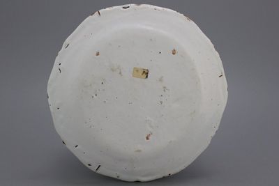 A Brussels faience lobed "floral hedge" plate, 18th C.