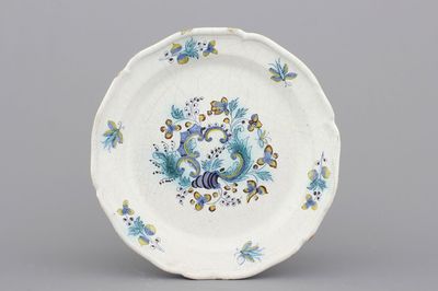 A Brussels faience rocaille plate, 18th C.