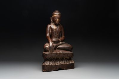 A Burmese lacquered and gilt wooden Buddha, 17/18th C.
