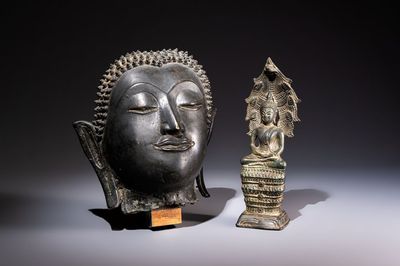 A Cambodian bronze Buddha and a Thai Buddha head, 19th C.