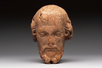 A carved limewood bearded male head, Germany, 18th C.