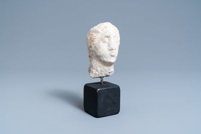 A carved stone head of a man, probably France, 15th C.