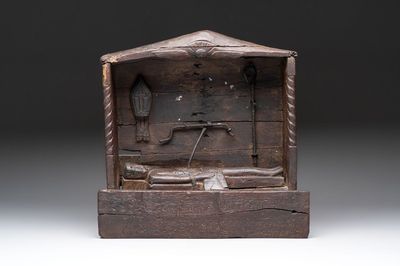 A carved wooden religious shrine depicting the martyrdom of Saint Erasmus of Formia, Germany, 17/18th C.