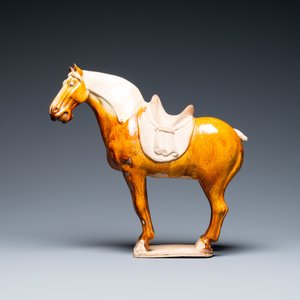 A Chinese amber- and cream-glazed pottery model of a horse, Tang — photo 2
