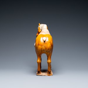 A Chinese amber- and cream-glazed pottery model of a horse, Tang — photo 3