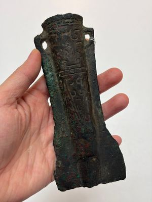 A Chinese archaic bronze fitting and a spearhead, Western Zhou — photo 1
