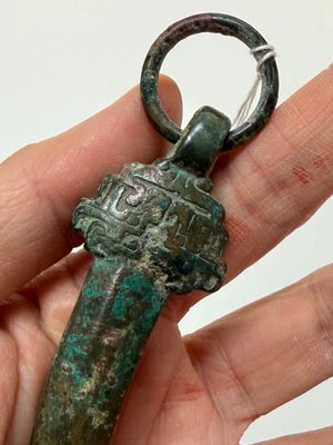 A Chinese archaic bronze fitting and a spearhead, Western Zhou — photo 14