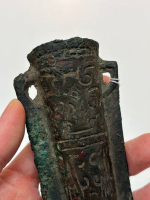 A Chinese archaic bronze fitting and a spearhead, Western Zhou — photo 2