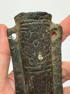 A Chinese archaic bronze fitting and a spearhead, Western Zhou — photo 5