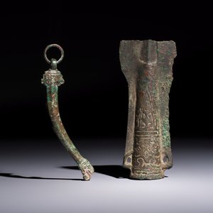 A Chinese archaic bronze fitting and a spearhead, Western Zhou — photo 1