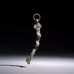 A Chinese archaic bronze fitting and a spearhead, Western Zhou — photo 11