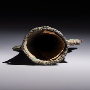 A Chinese archaic bronze fitting and a spearhead, Western Zhou — photo 6