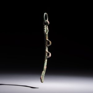 A Chinese archaic bronze fitting and a spearhead, Western Zhou — photo 9