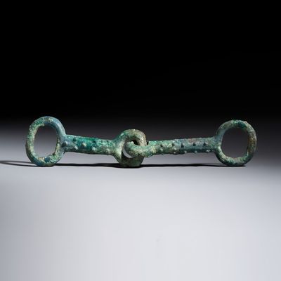 A Chinese archaic bronze horse bit, Eastern Zhou