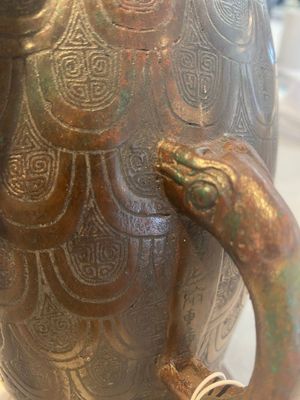 A Chinese archaic bronze inscribed wine vessel with scale design, 'hu 壺', Zhou — photo 28
