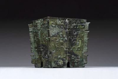A Chinese archaic bronze ritual wine vessel, 'yi 彝', Shang