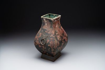 A Chinese archaic bronze vase with 'Taotie' handles, 'fang hu 方壺', Han