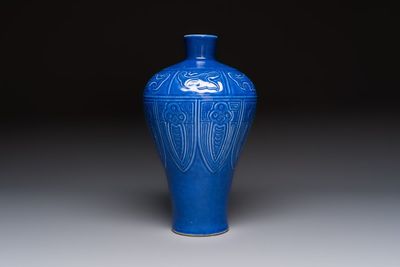 A Chinese archaistic blue-glazed vase with relief design, 20th C.
