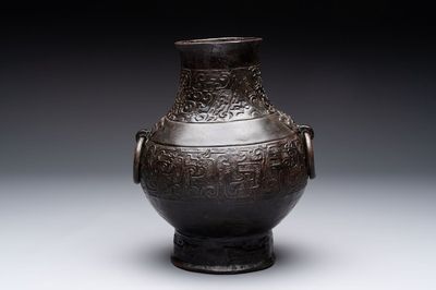 A Chinese archaistic bronze 'hu' vase with chilong design, Song/Yuan