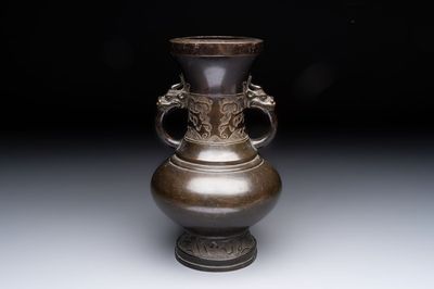 A Chinese archaistic bronze vase with 'mythical beast' handles, Yuan/Ming