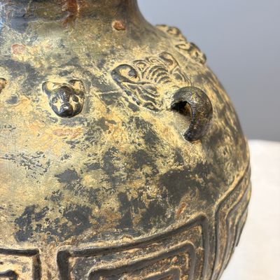 A Chinese archaistic bronze vase with taotie handles — photo 7